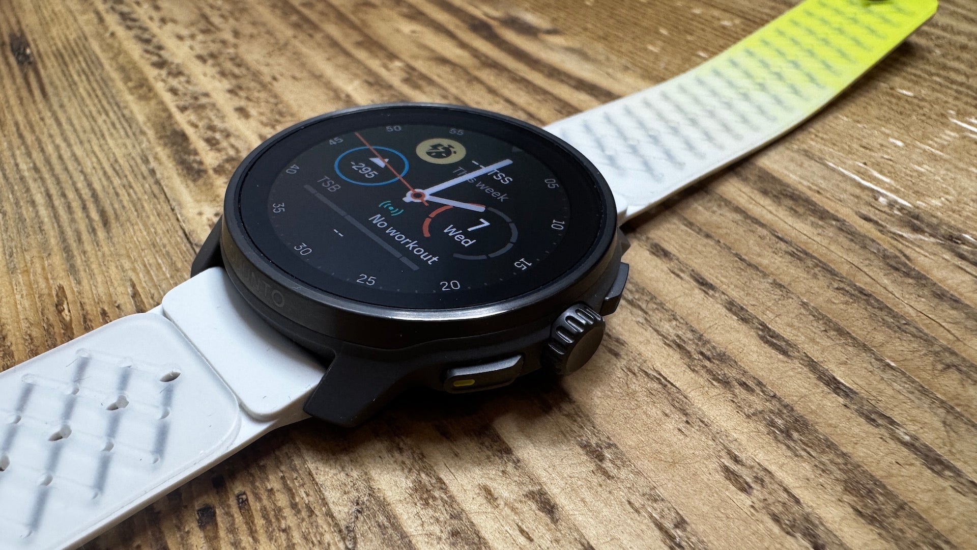 Side view of the titanium Suunto Race S running watch