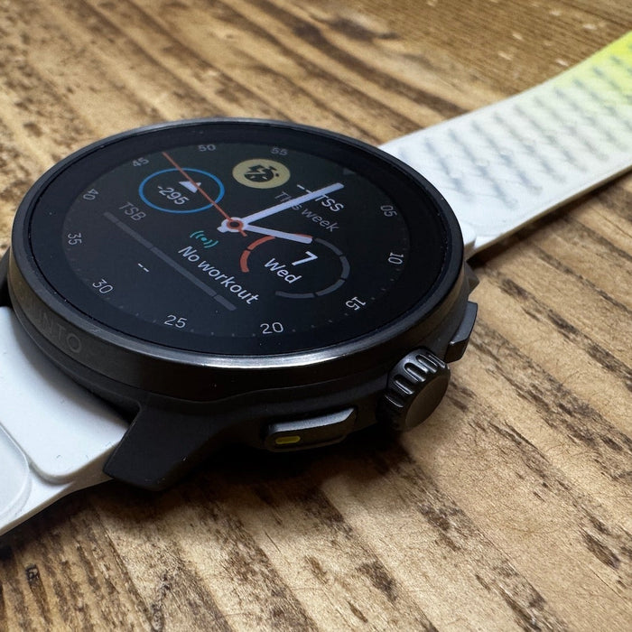 Side view of the titanium Suunto Race S running watch