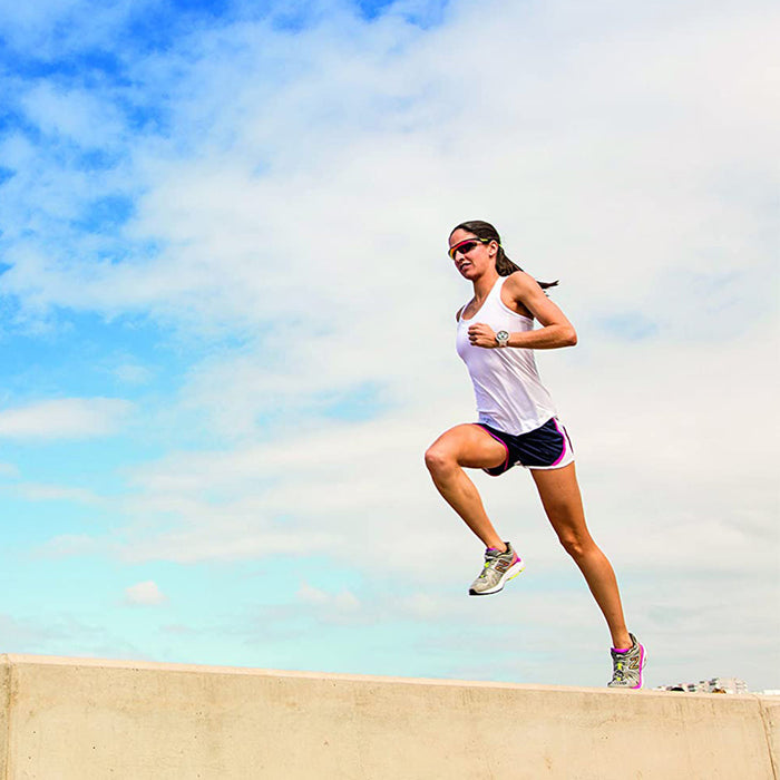 Woman running while using the Garmin HRM-Run