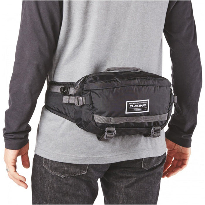 Man wearing Dakine Hot Laps 5L Bike Waist Bag in black color